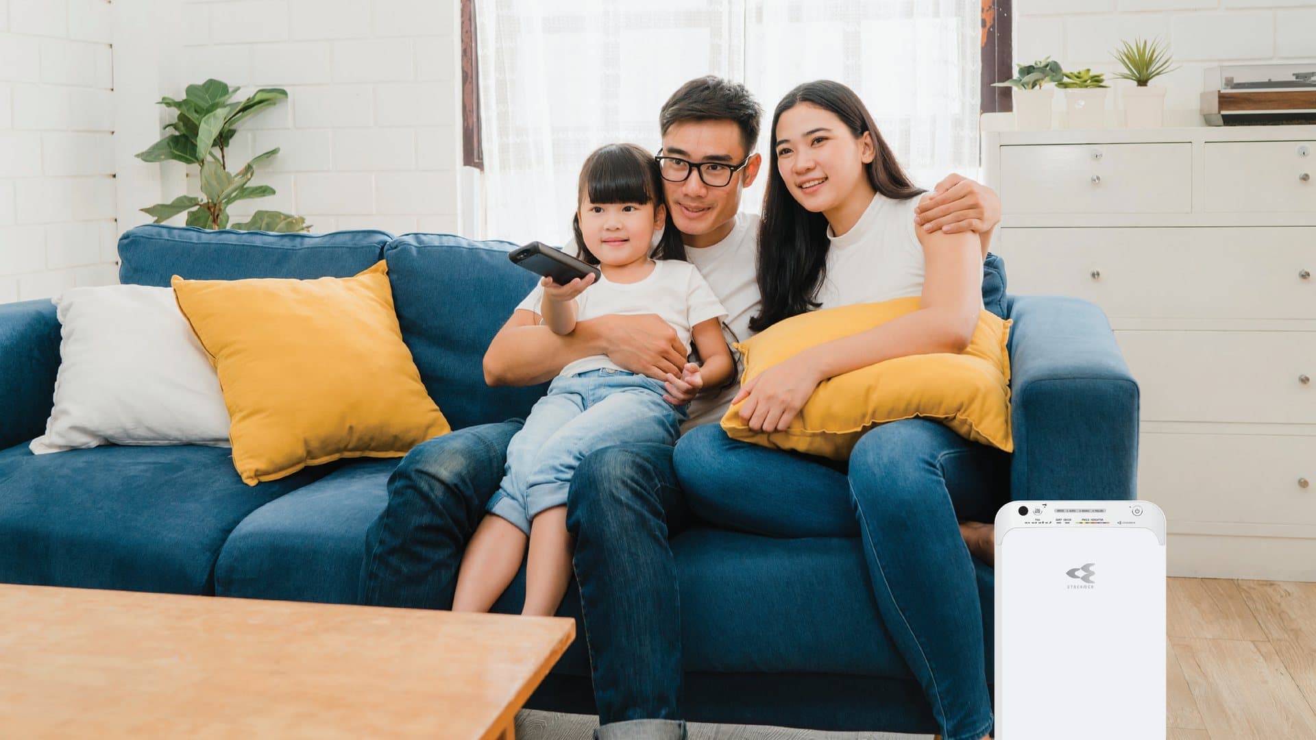 Daikin MC55XVMM air purifier in a living room, from Daikin's brochure.