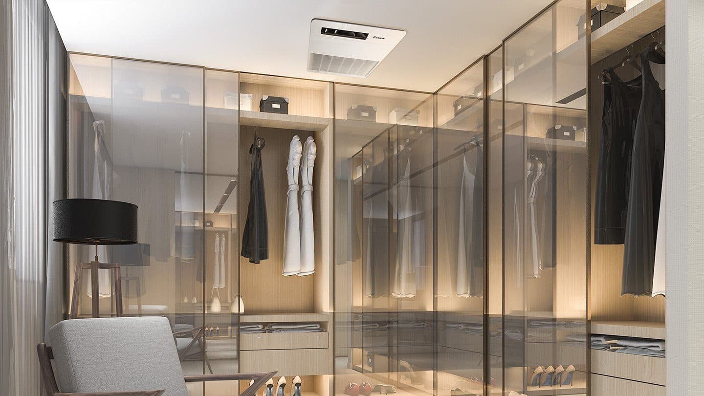 A walk-in closet with a ceiling unit.