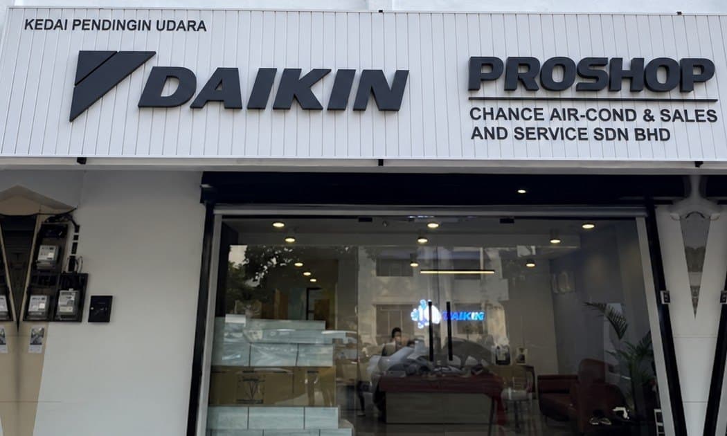 The CASS office frontage, with Daikin PROSHOP signage above the glass front.