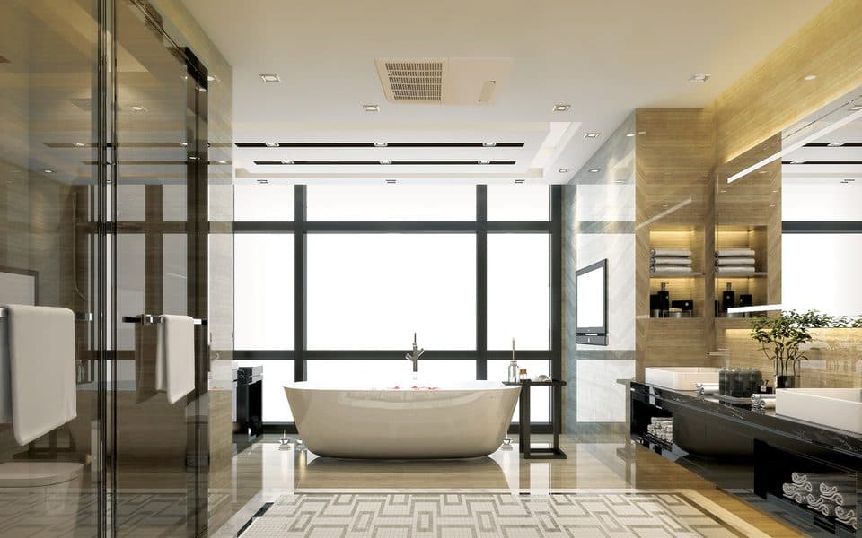 A bathroom with a ceiling unit.