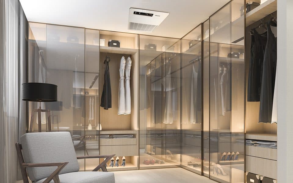 A walk-in closet with a ceiling unit.