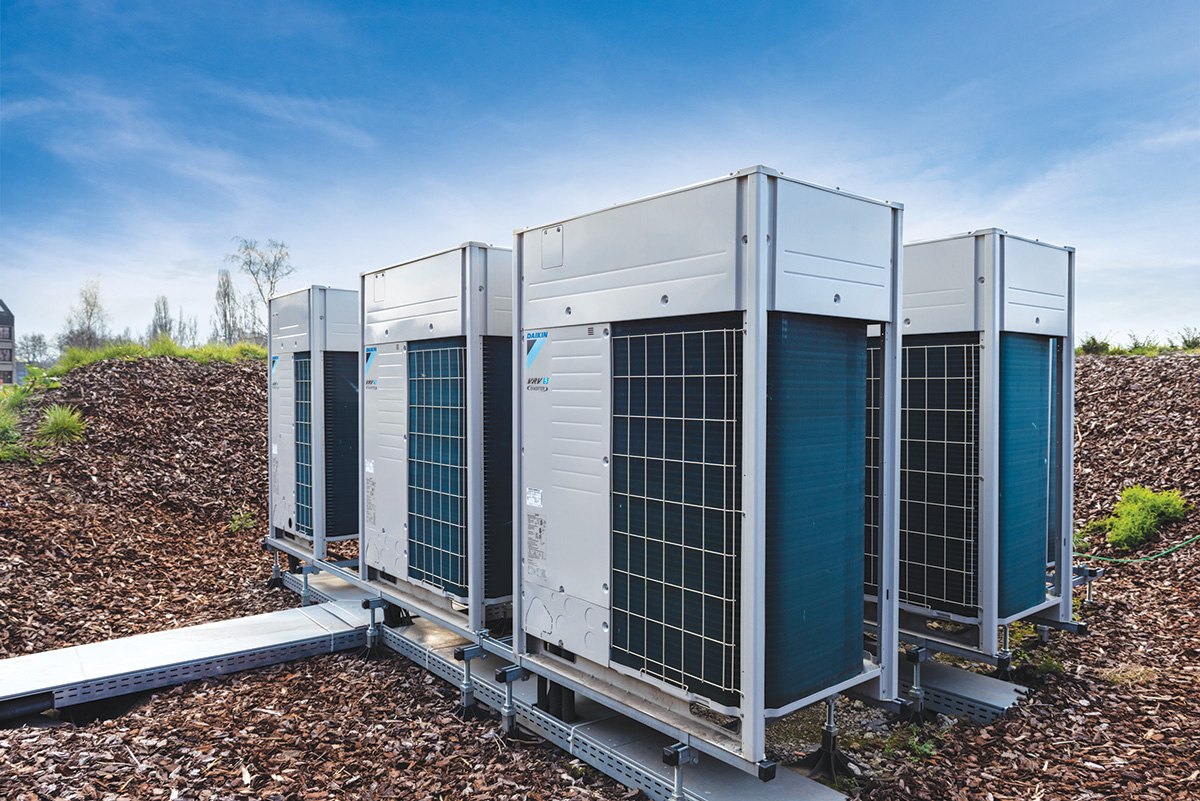 A bank of Daikin VRV outdoor modules installed outside a building.